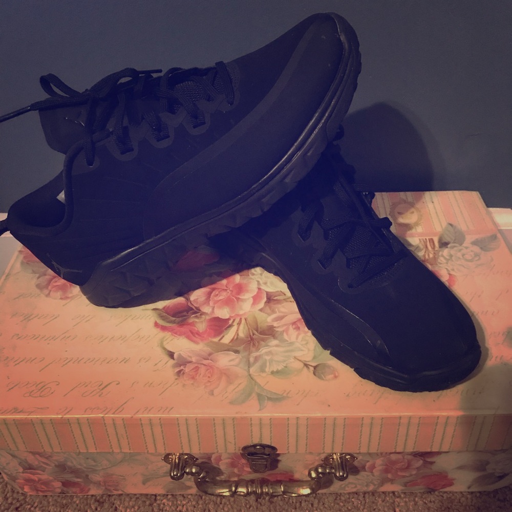 All black Big Kids Jordans